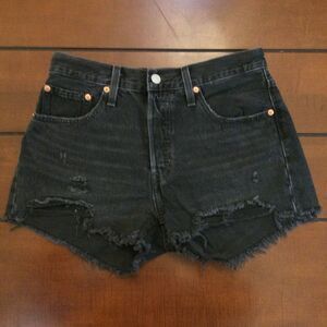 Levi’s 501 raw hem black button-fly jean shorts 28 jorts